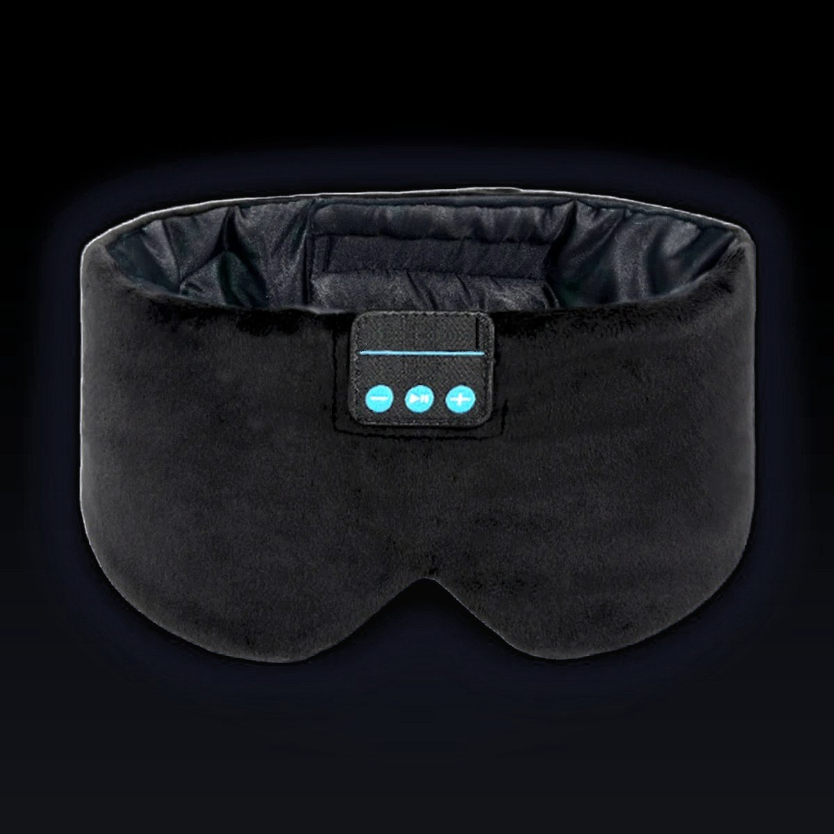 The Dual-Clearance Sleep Mask in Midnight Black, front on: wide black velvet band, two molded eye cups, dark satin lining inside and the three-button control panel.