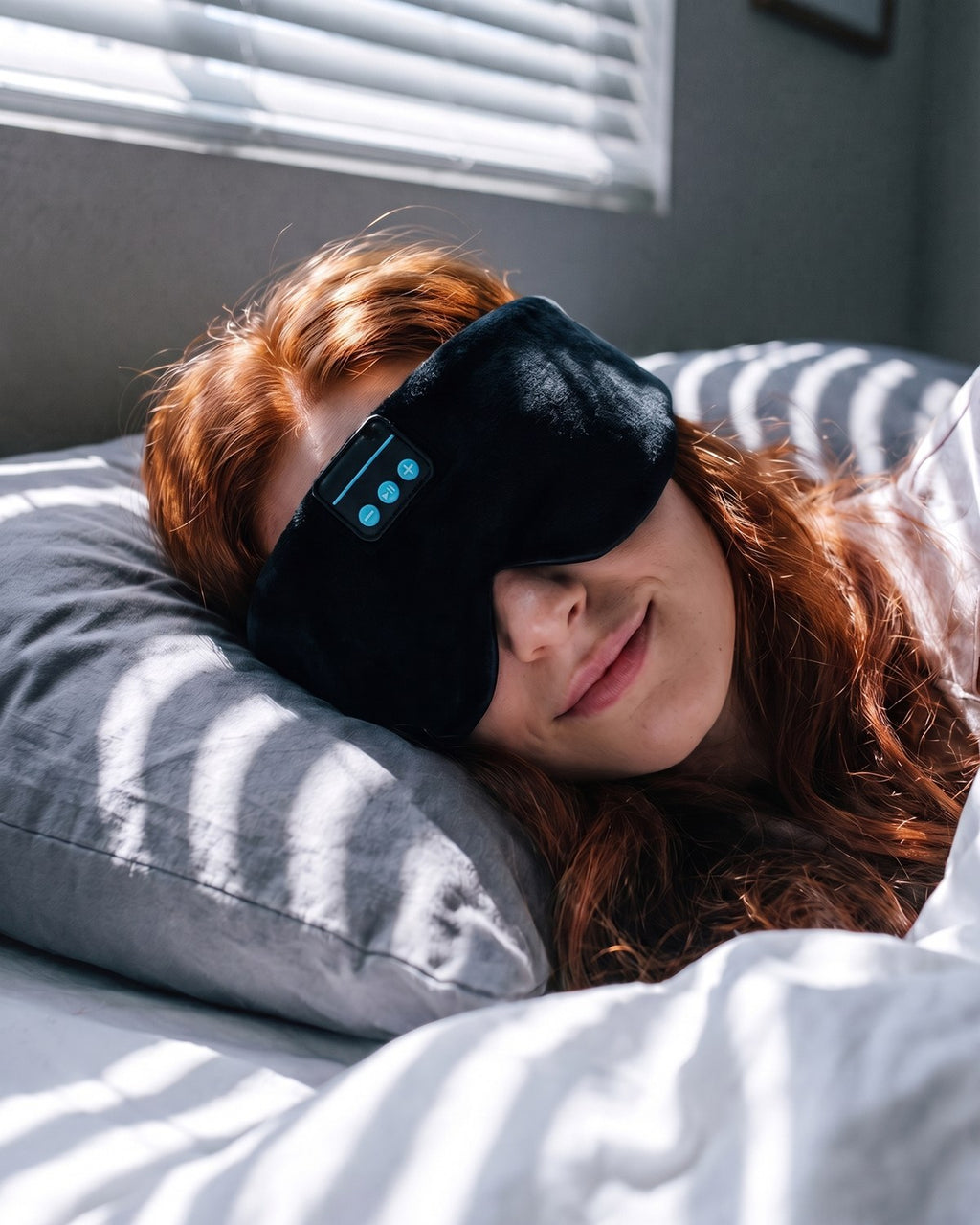 A night-shift worker sleeping in daylight with the Dual-Clearance Sleep Mask.